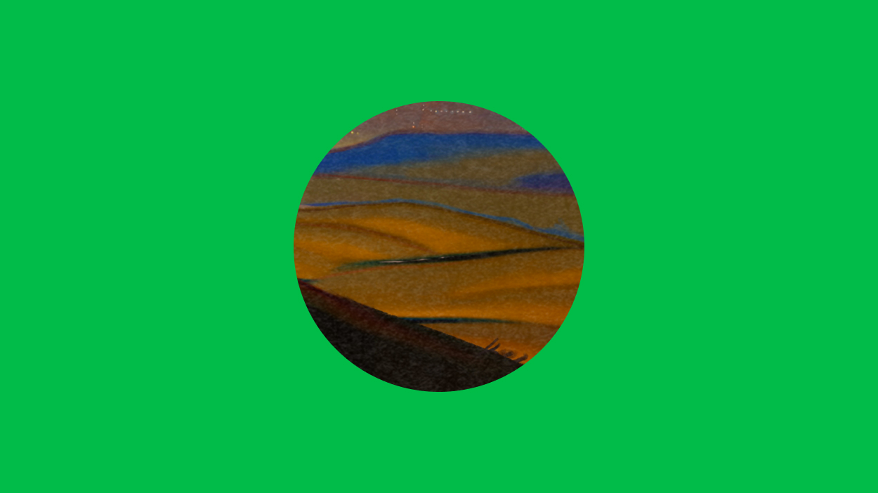 Mountain circle on green background.