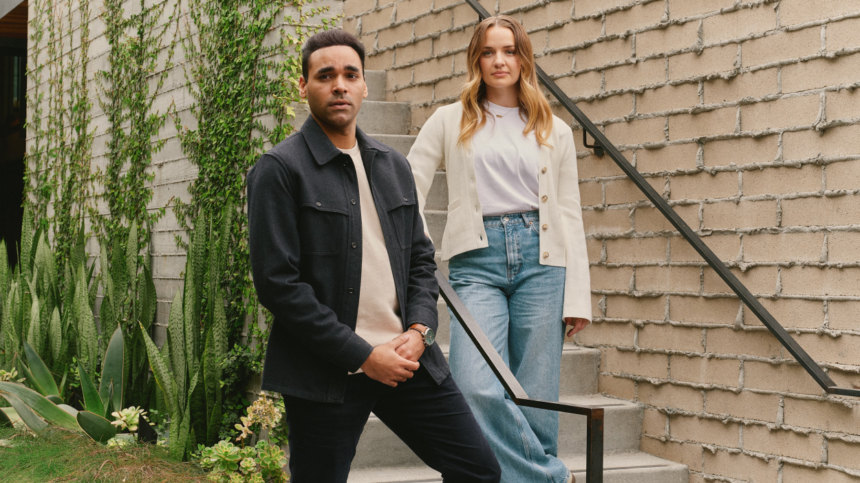 Two advisors in office courtyard